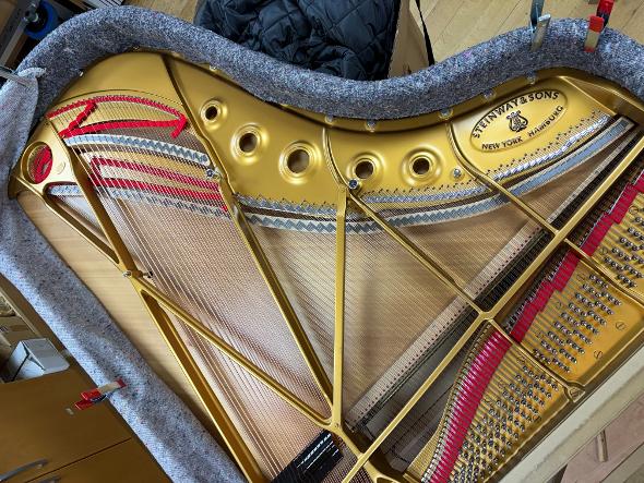 Full restring of a Steinway Model B Grand Piano